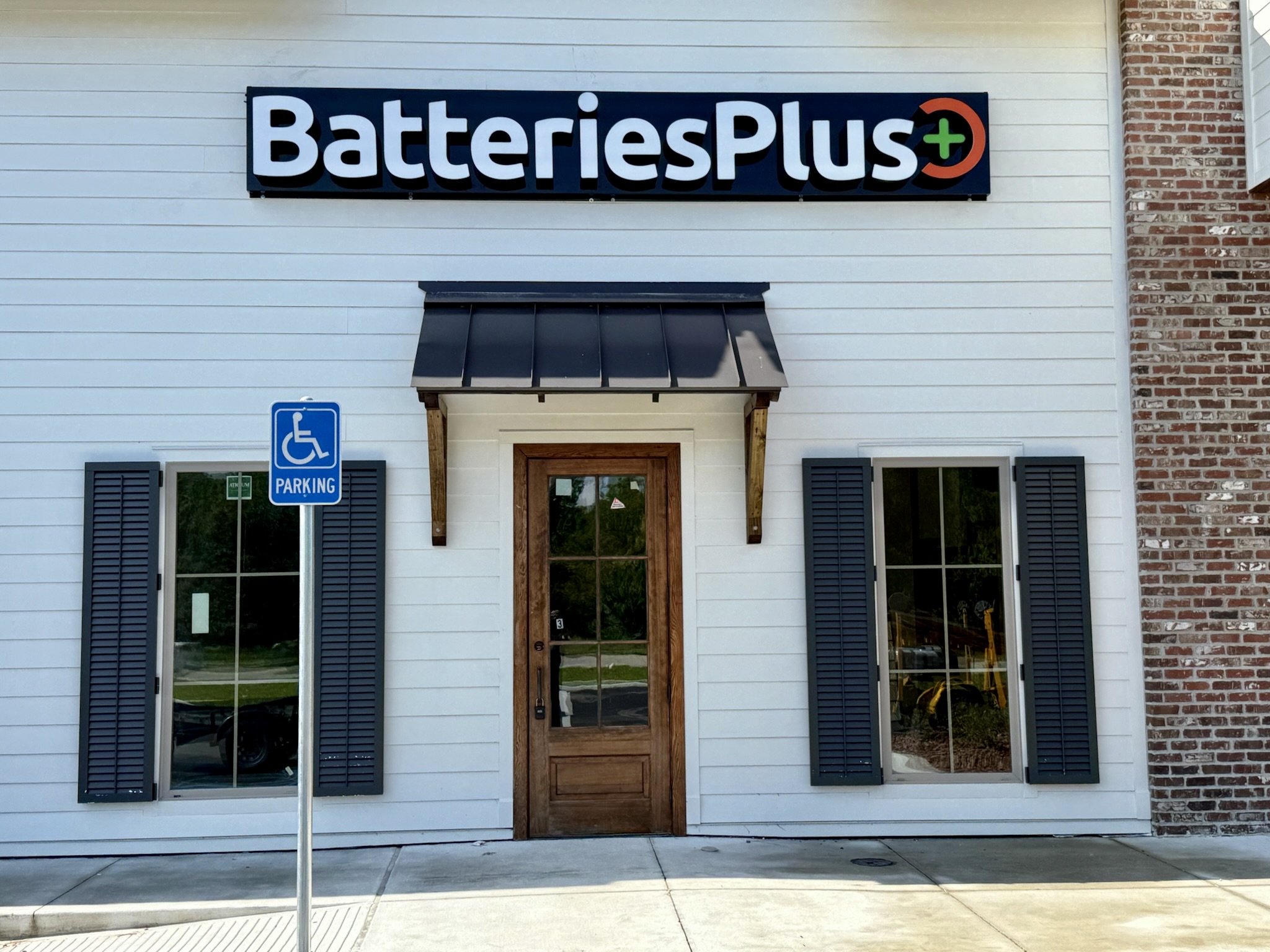 Illuminated storefront business sign