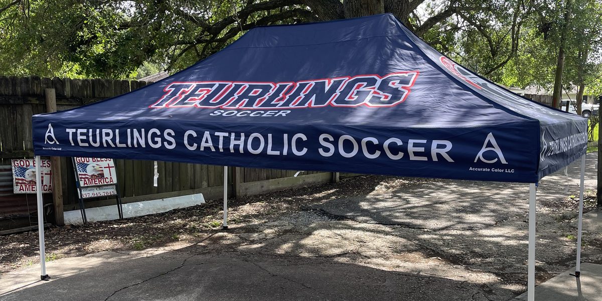 Teurlings Catholic Soccer 10x15 canopy tent set up outdoors