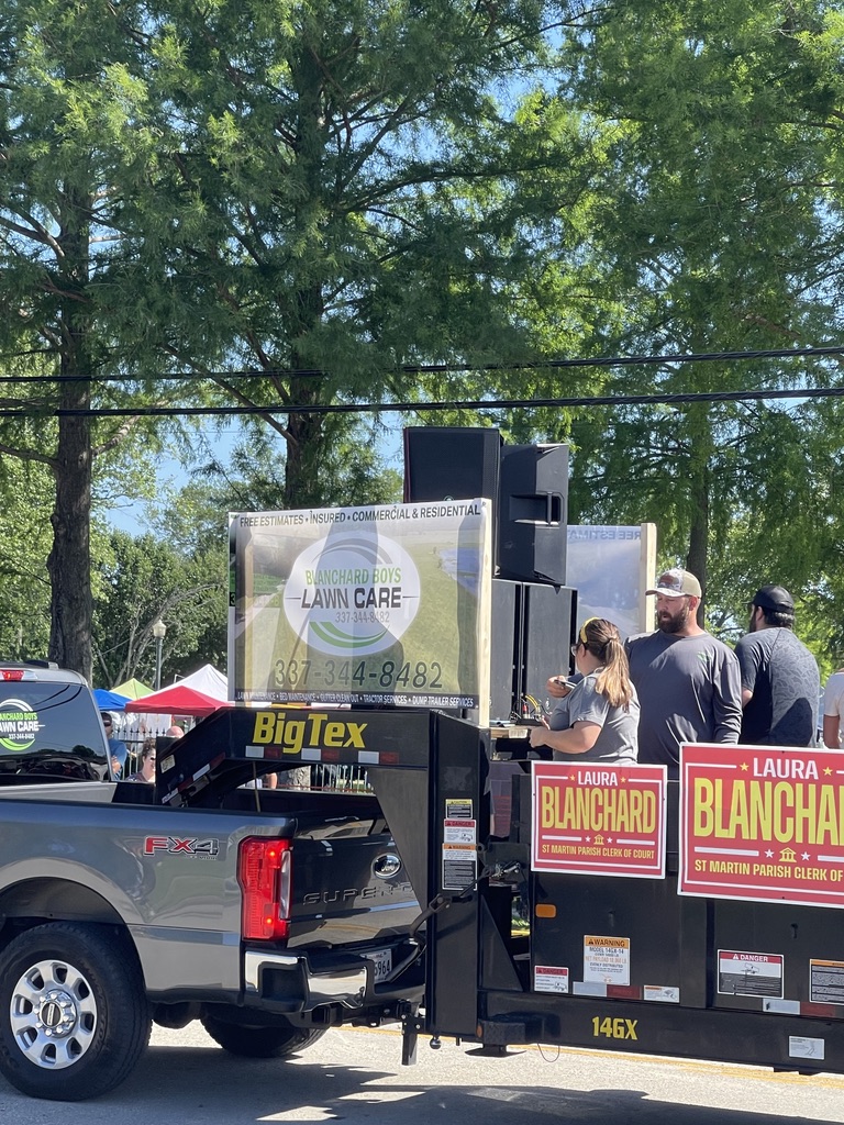 Printed event banner at an outdoor festival